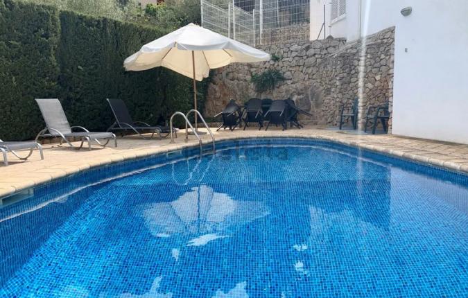 For Sale in Portals Elegant 3 Bedroom Semi Detached Townhouse With Communal Pool